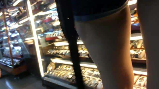 Secretly filming student girls shopping 