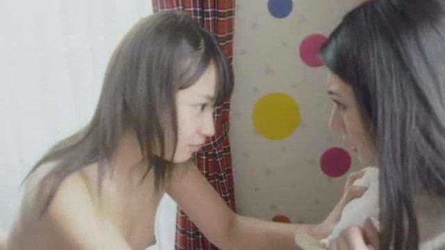 Two girls having sex in bed 