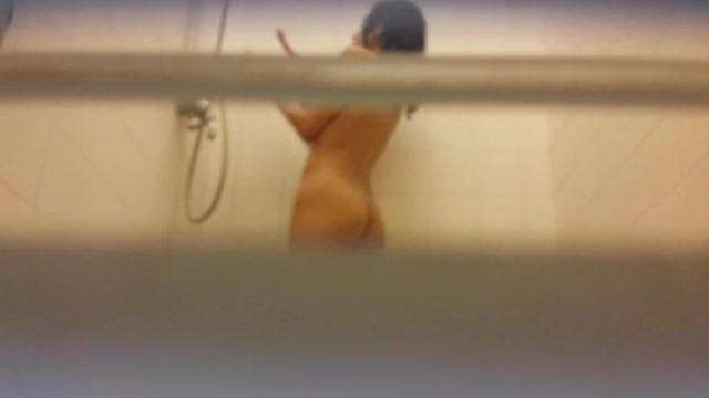 Secretly filming senior sister taking a shower 
